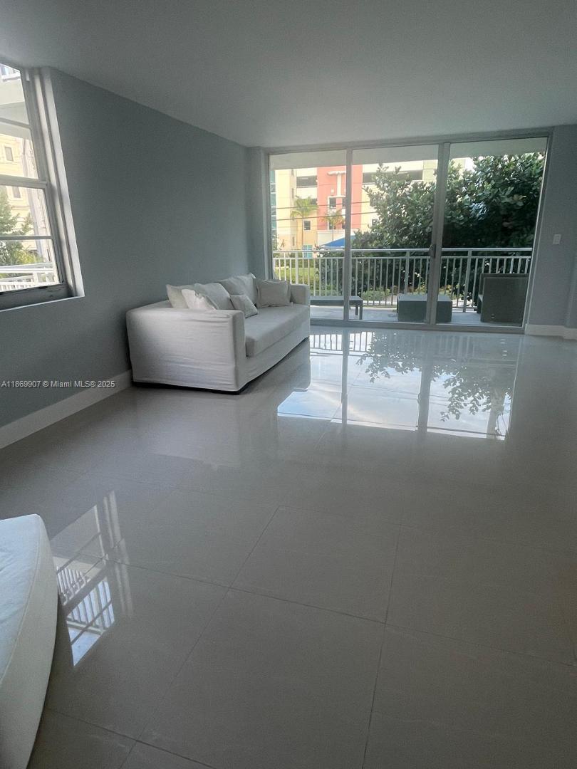 Step into luxury living with this stunning 1-bedroom, 1.5-bathroom condo plus extra room perfect for a home office or easily converted into a second bedroom. This light-filled corner unit has just been completely renovated and features sleek porcelain floors, hurricane impact windows, and electric shades throughout. Huge wrap-around balcony, or relax in the buildings community pool or recreation room. Additional perks include one assigned parking space, separate storage unit, and a laundry room located just steps from the apartment. Located in a boutique building with canal access, this residence is ideally positioned within walking distance to A rated schools, world-famous Bal Harbour Shops, restaurants, and the beach. This is truly one of the best locations in Bay Harbor Islands.