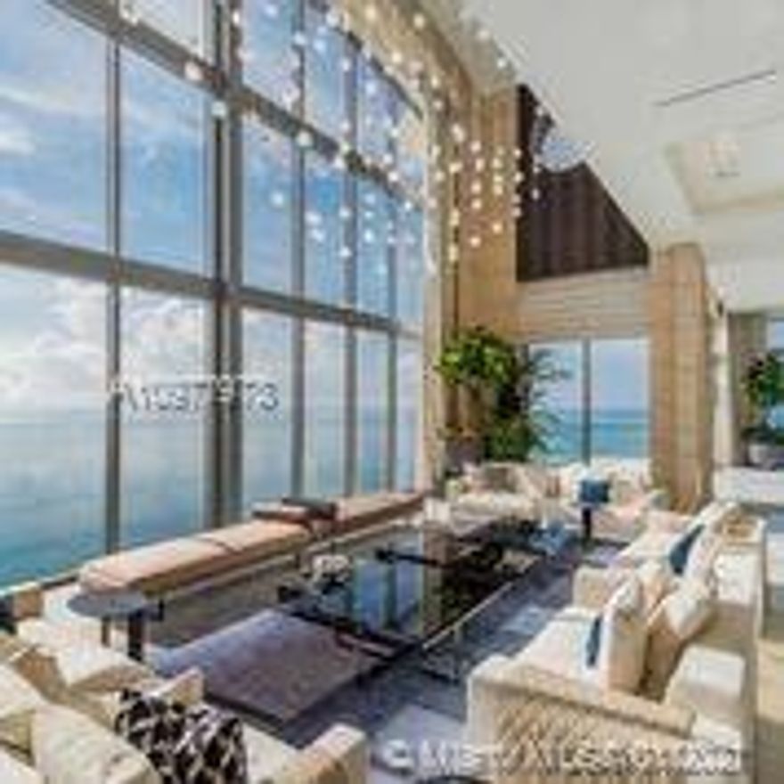 4 BEDROOMS / 6.5 BATHS   9103 SQFT LIVE ON TOP OF THE WORLD , FROM 15' - 30 'CEILINGS , PRIVATE 12' GLASS BOTTOM CANTILEVERED  POOL , FULLY FURNISHED BY LUXURY LIVING FENDI , BENTLEY , 9103 SQFT OF LIVING SPACE , TWO KITCHENS , STONE CLAD WALLS , A MUST SEE, BE APART  OF THE ACQUALINA FAMILY , 3 RESTUARNTS  , TWO POOLS , 20,000 SQFT ESPA