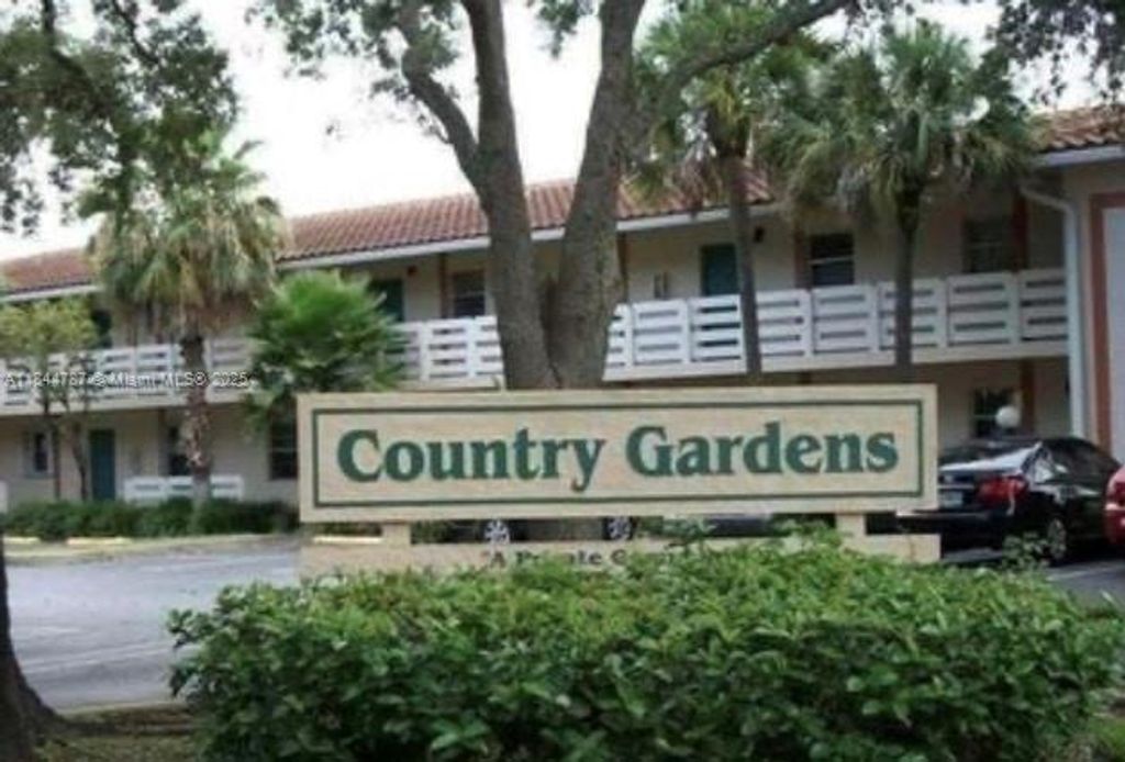 Photo of 3201 NW 103rd Ter #101-C, Coral Springs, FL 33065 (MLS # A11844787)