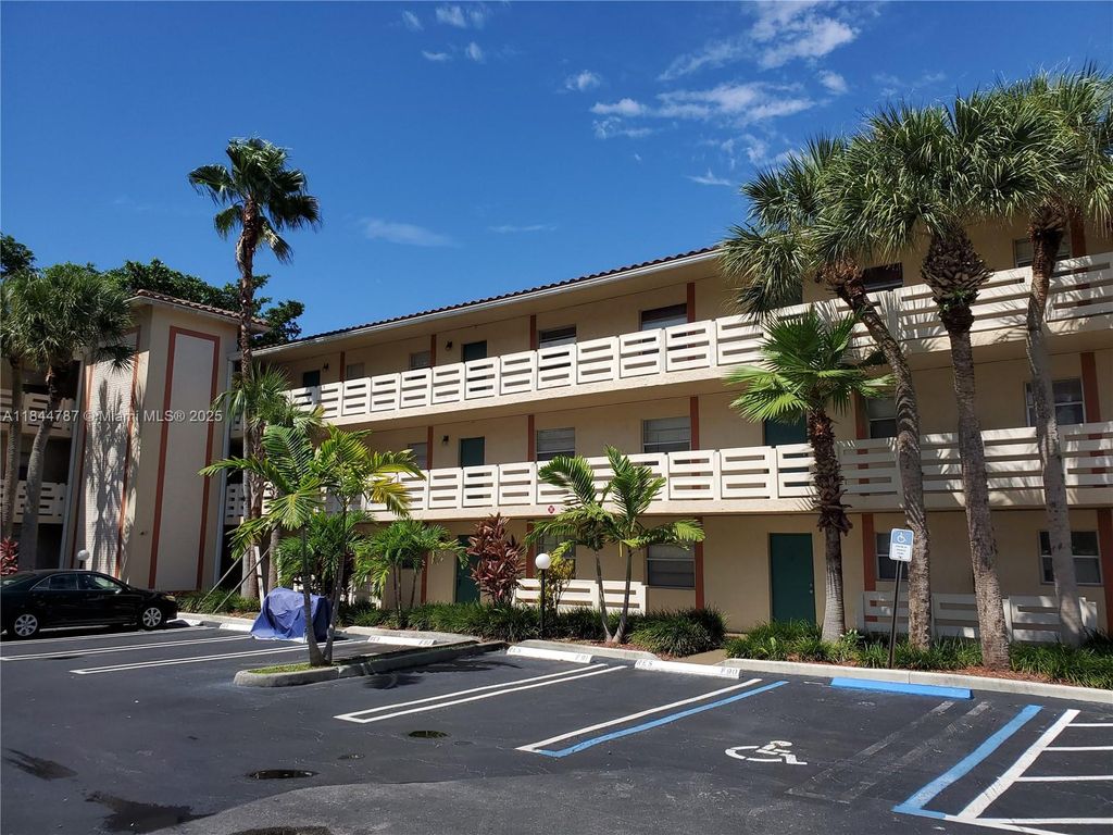Photo of 3201 NW 103rd Ter #101-C, Coral Springs, FL 33065 (MLS # A11844787)