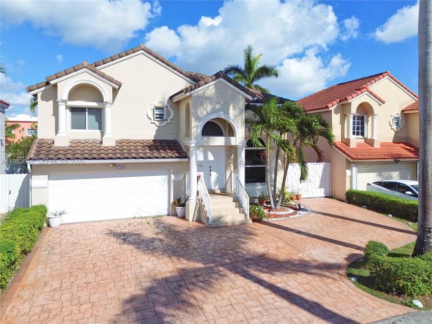 Stunning 4-bedroom, 3-bathroom residence featuring a convenient first-floor bedroom with a full bathroom—ideal for in-law quarters or potential efficiency for additional income. The home boasts soaring ceilings and abundant natural light throughout.
Recent upgrades include a newer roof (2019) and A/C (2014). Equipped with full impact windows, an impact garage door, and additional electric shutters for enhanced safety. The kitchen showcases beautiful granite countertops.
This home includes a spacious 2-car garage and a generous backyard with low-maintenance synthetic grass, a metal fence, and a side awning, perfect for outdoor living and entertaining. Located in a No-Flood zone within a quiet residential neighborhood.
Enjoy serene Lakeview and access to the community pool and fully equipped gym. The community offers a very low and stable HOA, with no increases in over 10 years. Close to excellent schools, parks, and just minutes from the Turnpike, Dolphin Mall, and other major shopping and dining destinations.