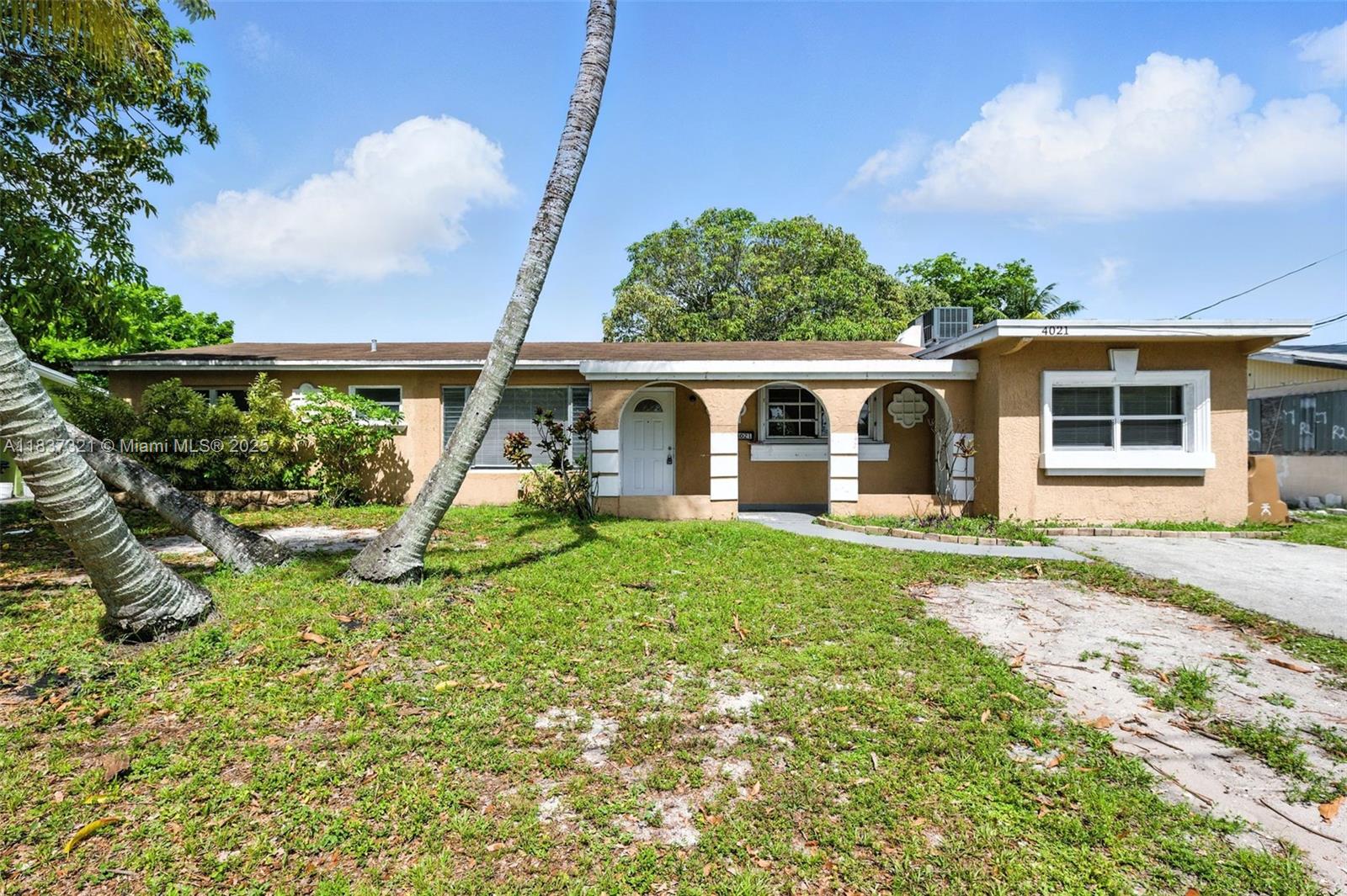 Move-in ready ranch style home featuring a spacious 4/2 layout plus a versatile flex room. The property offers a large waterfront backyard with plenty of space for outdoor living and entertaining.