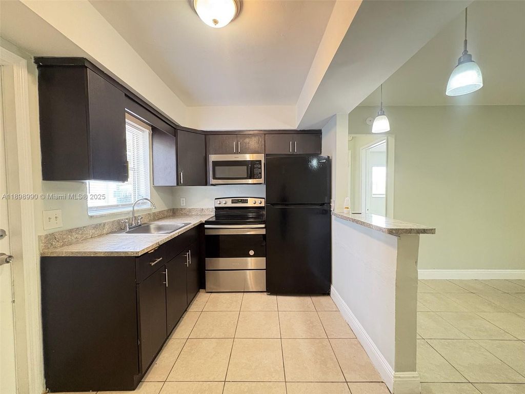 Photo of 4340 NW 21st Ave #1, Oakland Park, FL 33309 (MLS # A11898990)