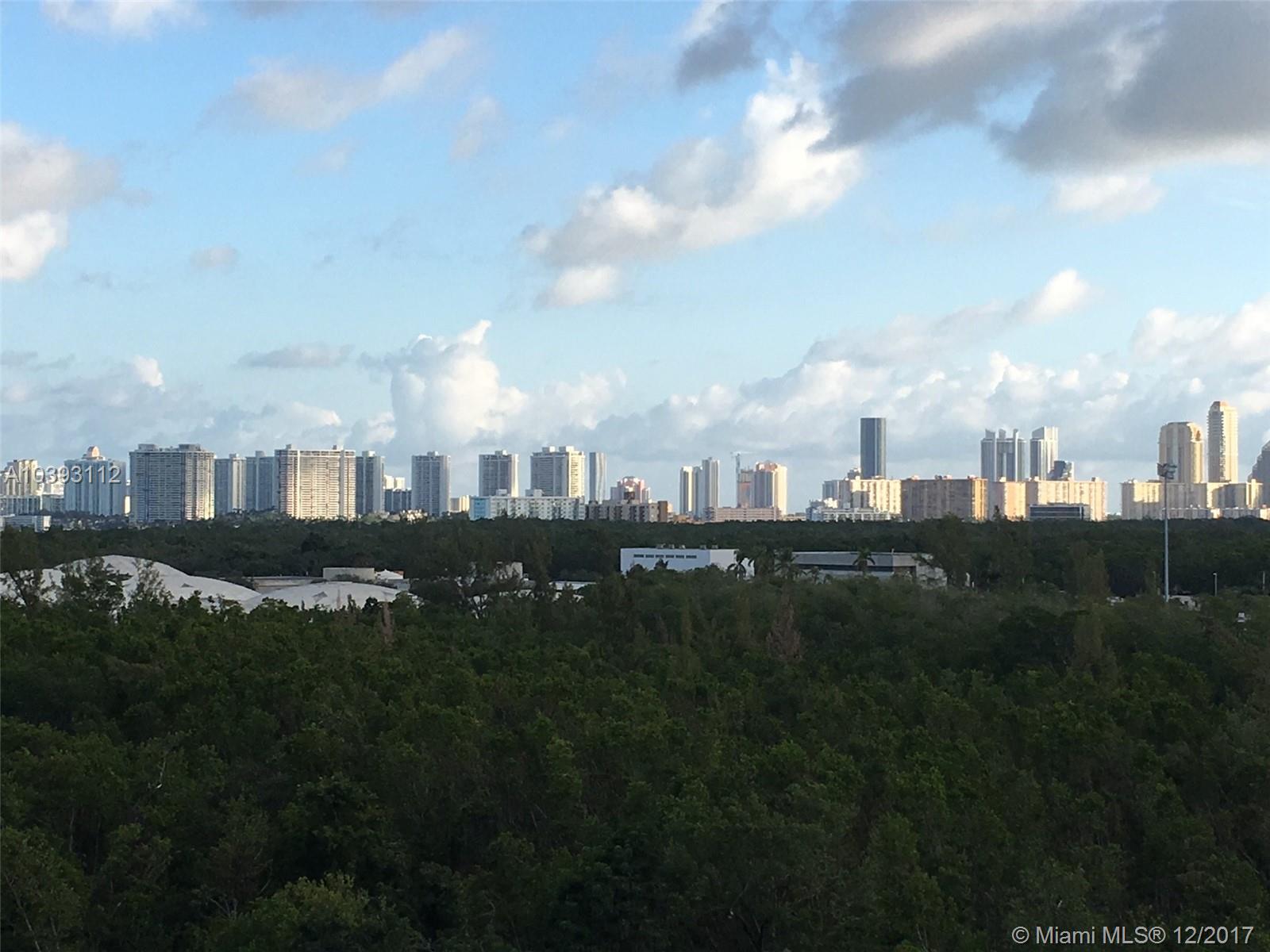 Large 2 Bedroom + Den 2 Full Bath. Expansive walking closets, corner unit, spectacular view. Walking distance to FIU & Schools. High, Middle and Elementary. 1.5 Mile to the Beach. Stainless Steal appliances, granite big balcony. Gym, beautiful pool. Social Room, Billard, Tennis Courts, Water, Cable & Internet included in the rent. Security gate, Easy access to I95 and 826. Equal Housing opportunity.