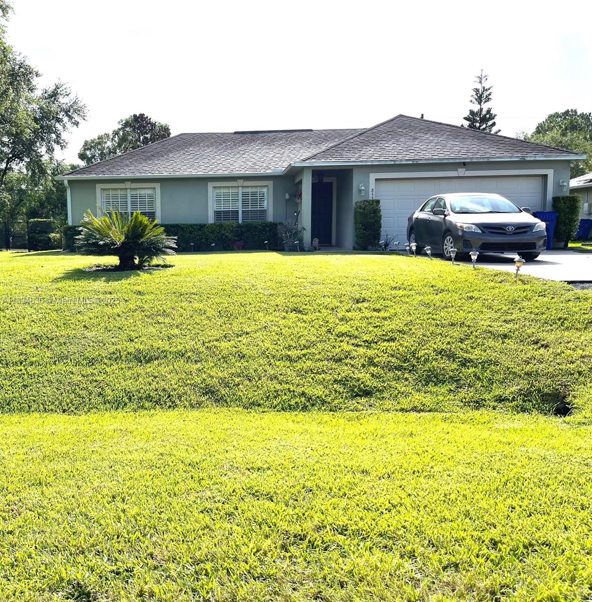 Priced to sell! NO HOA! This charming 3-bedroom, 2-bath Vero Beach home is nestled in the fast-growing community of Vero Lake Estates. Featuring a new kitchen with a beautiful backsplash, and quartz countertops, this home offers a spacious layout perfect for a first-time buyer or a relaxing vacation retreat. Enjoy Florida living with a large, fenced backyard complete with fruit trees—ideal for entertaining or unwinding. A screened-in back porch and covered front porch provide the perfect spots to soak up the sunshine. Conveniently located near I-95, beaches, golf courses, and more—this is a must-see!