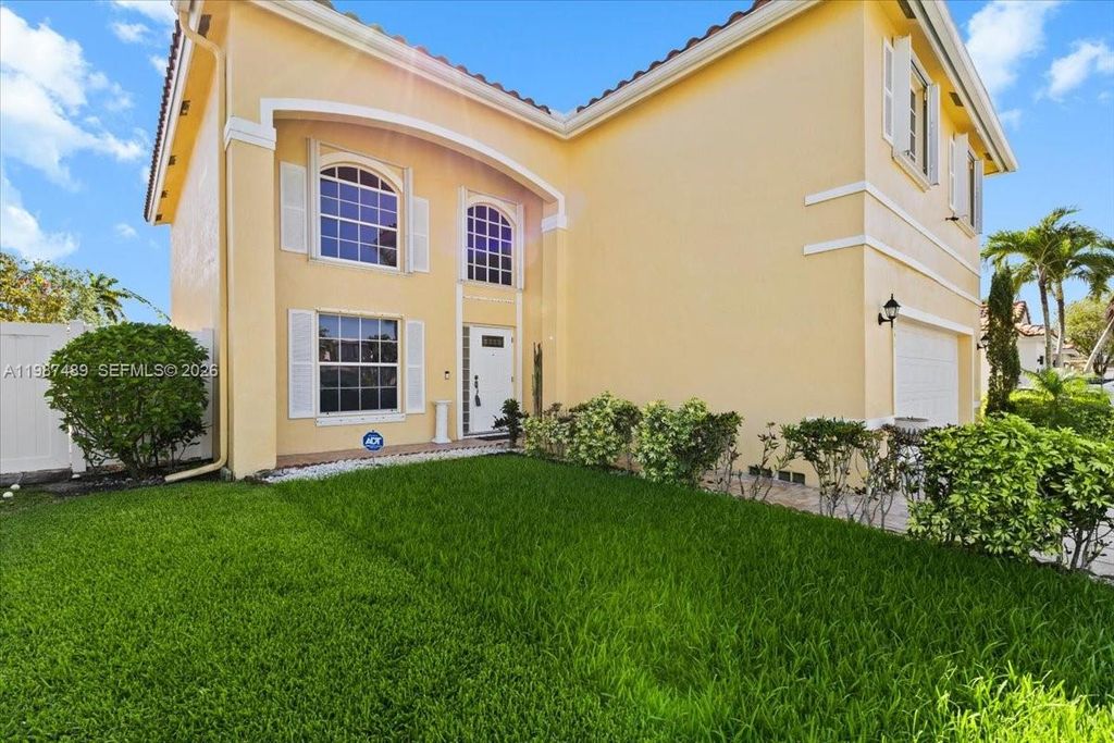 Photo of 1041 NW 189th Ave, Pembroke Pines, FL 33029 (MLS # A11987489)
