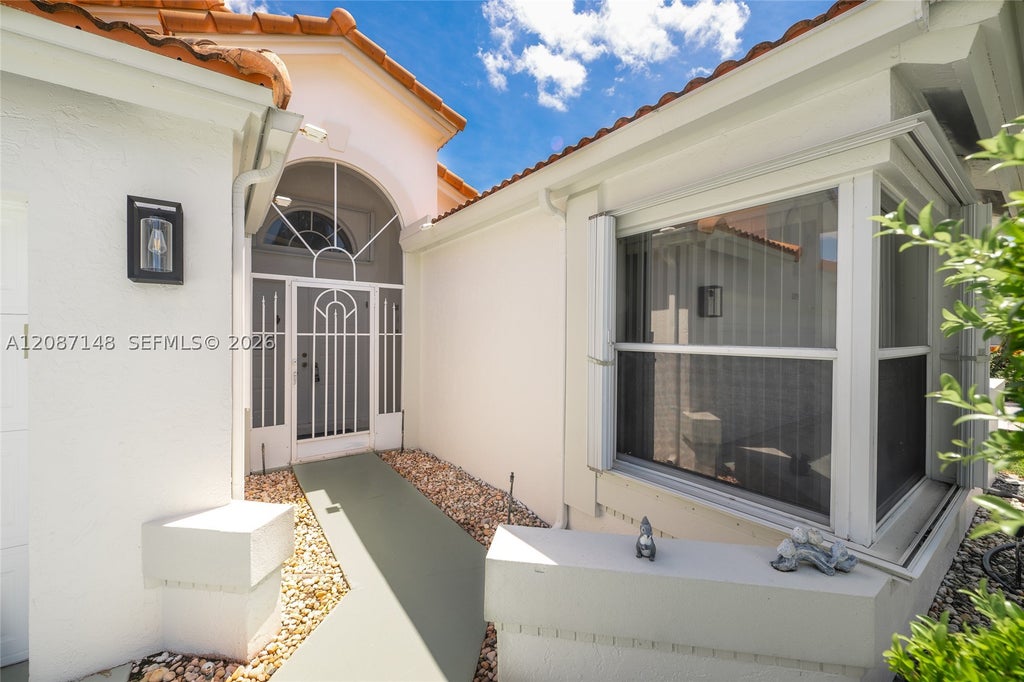 Photo of 9706 Harbour Lake Cir, Boynton Beach, FL 33437 (MLS # A12087148)