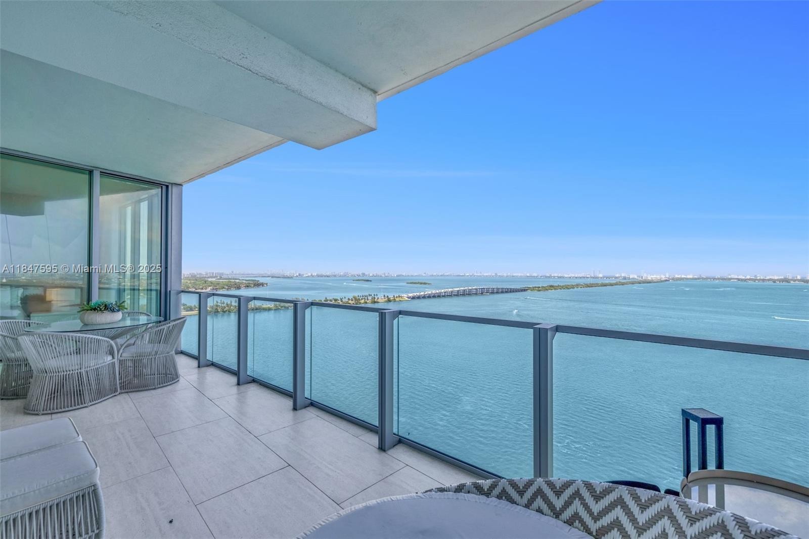 Unlike anything else on the market—Unit 2103 offers 2 bedrooms, 3 full bathrooms, and direct, unobstructed views of Biscayne Bay, the cruise ship causeway, and Miami Beach. Enjoy a private elevator entry, soaring ceilings, floor-to-ceiling windows, and a spacious balcony to soak in the views. Water views from both bedrooms and living room. Gourmet kitchen with Miele appliances. Located in Miami’s premier bayfront tower with exclusive beach club, 2 pools, cabanas, tennis, basketball, gym, spa, dog park, and 24/7 concierge. Minutes to Design District, Wynwood, and Miami Beach. Resort living at its finest! Own the views, the lifestyle, and the exclusivity. Schedule your private showing today and make it yours.