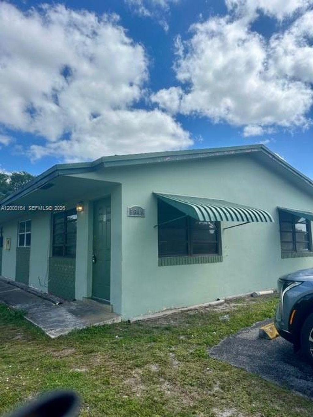 Photo of 5649 SW 27th St #1, West Park, FL 33023 (MLS # A12000164)