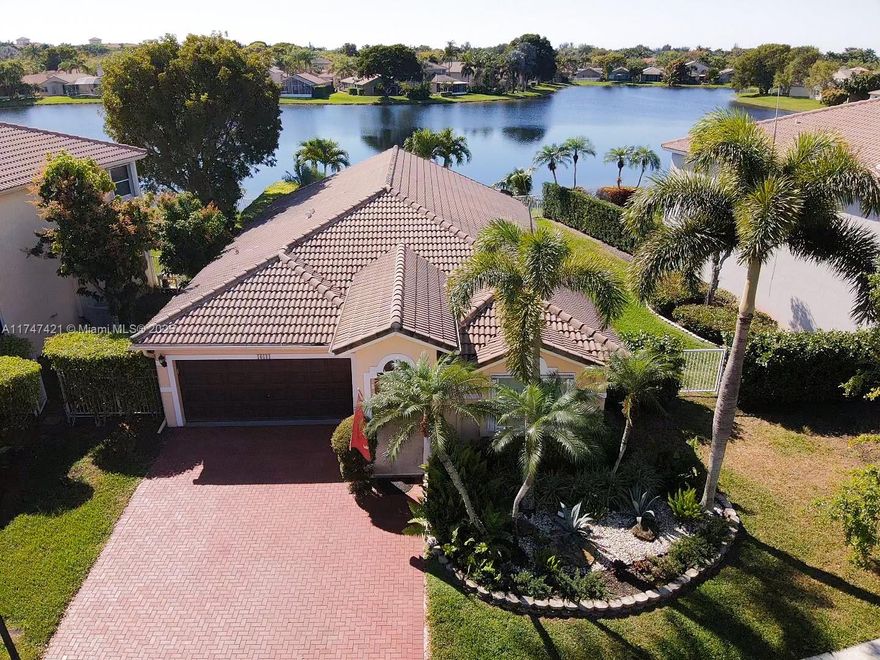 Seller contributing to closing costs!! Bright and spacious one-story 3-bed, 2-bath lakefront view plus a den, perfect for a home office, all on nearly half an acre in the prestigious gated community of Emerald Estates. This split-floor plan features impact windows, hurricane shutters, and custom kitchen and living area upgrades throughout.
Low $375/month HOA covers cable, internet, alarm monitoring, 24/7 security, landscaping, sprinklers, a community pool, gym, and playground. Walk to Emerald Estates Park with trails and a party pavilion. Easy to Show.
See the magic for yourself—ask for the 3D tour video today!
