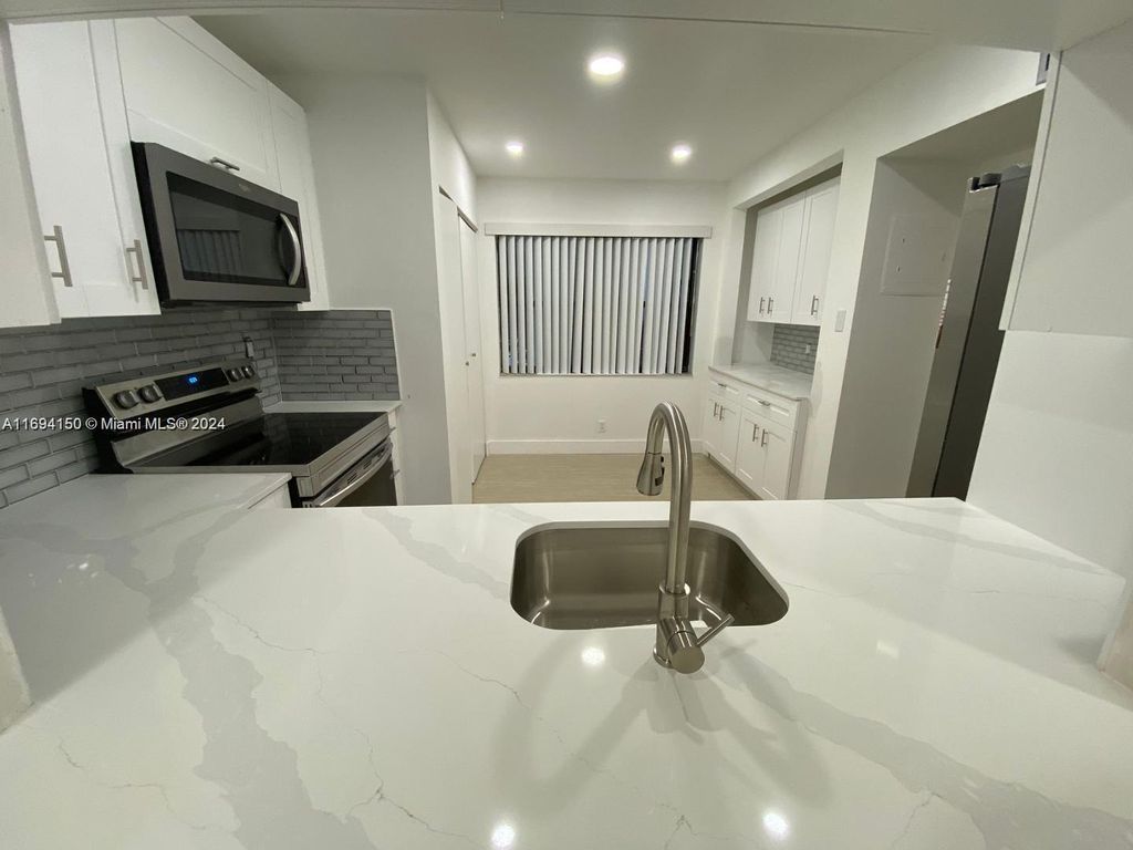 Photo of 1501 NW 13th St #Apt 3, Boca Raton, FL 33486 (MLS # A11694150)