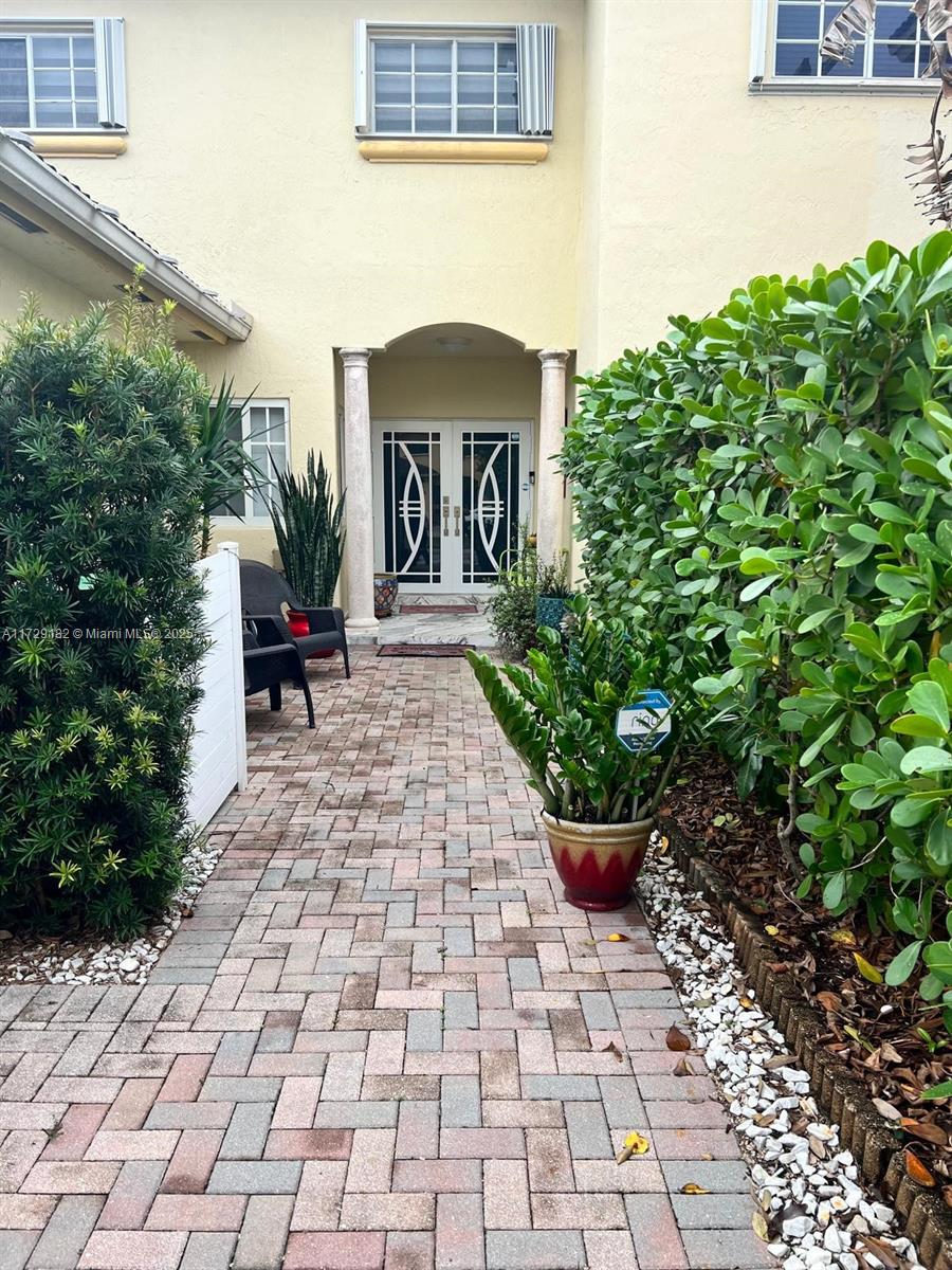 Amazing Townhome ! A MUST SEE !! This beautiful 5 bedroom 3 bath townhome has been Completely Remodeled !! 2 bedrooms downstairs with a full bath, great for inlaws. Garage was turned into an additional bedroom but can be turned back into a garage. Lots of closet space throughout the unit. Large masterbedroom with huge walkin closet. Nice back yard for entertaiment, lots of shopping centers near by. Very low HOA fee.