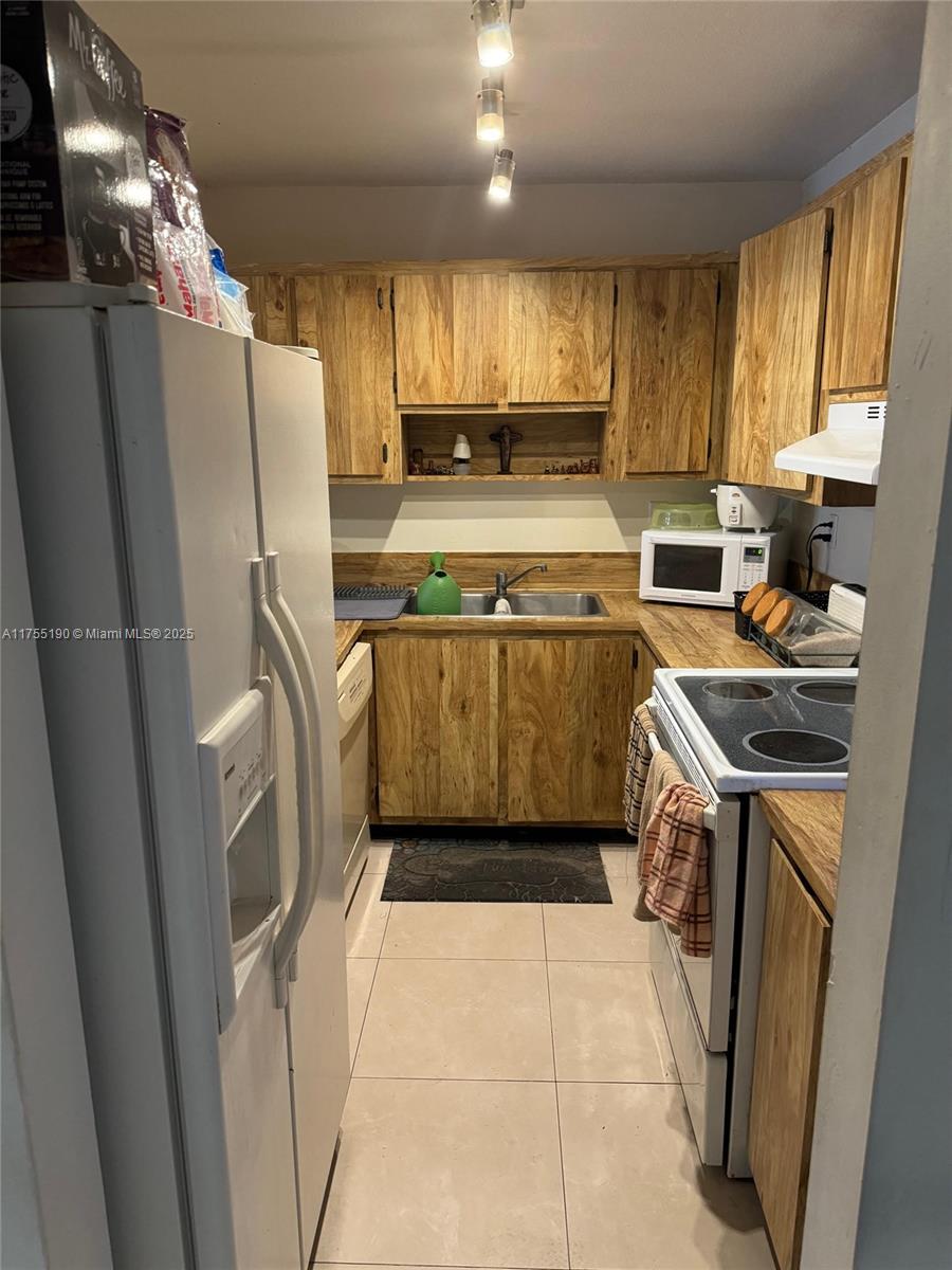 WISPERWOOD VILLAGE CONDO - Residential