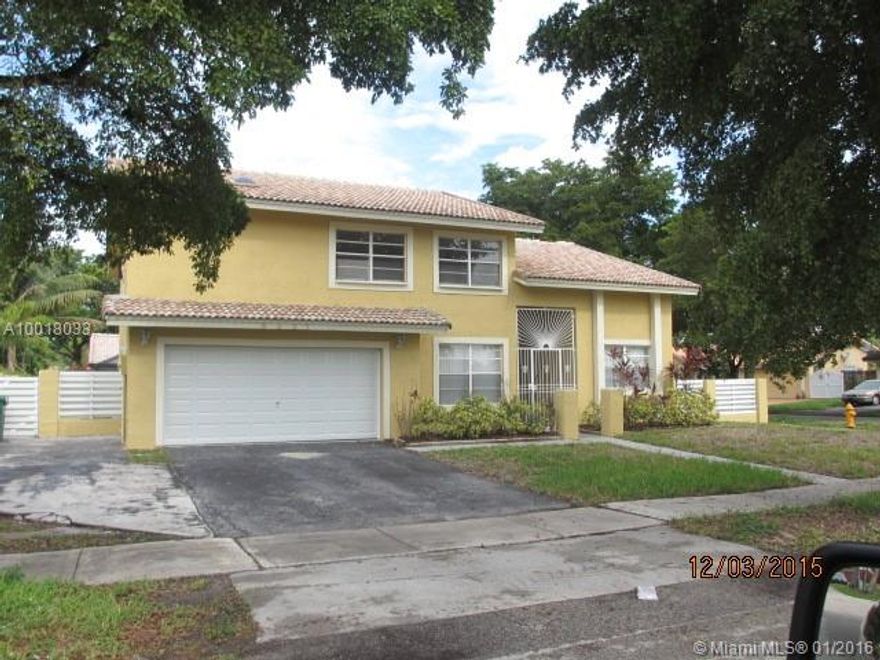 Exceptionally maintained 4 bedroom , 3 bath, 2 story Pool , with two car garage. Home, located on corner lot.  Freshly  painted inside and out. Updated kitchen, new flooring.  There is a 1 bedroom, 1 full bath downstairs. Ready  for  immediate occupancy