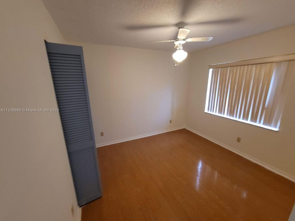 Photo of 110 SE Village Dr #110, Saint Lucie Village, FL 34952 (MLS # A11339666)