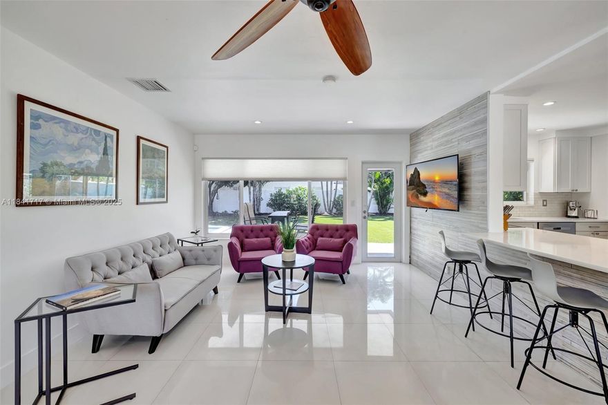 Dream home in the heart of Ft. Lauderdale! This entertainer's paradise with an expansive fenced in backyard with built in grill, pool, play & playground area, custom turf & elegant landscaping. 4 bedrooms and 3 bathrooms plus a separate office/living space make this home the perfect find. Located in the sought after Coral Ridge/Bayview school district, with just a short walk to the beach, dining & entertainment in the Galt Ocean Mile. Convenient to enjoy all the wonderful activities in downtown Ft. Lauderdale, Las Olas, FAT Village arts district & Lauderdale-by-the-Sea. Additional features: Impact windows & doors, metal roof, EV charger, porcelain tile throughout, custom white kitchen with Silestone countertops. This home is ready for you! **Can be rented with or without furniture**