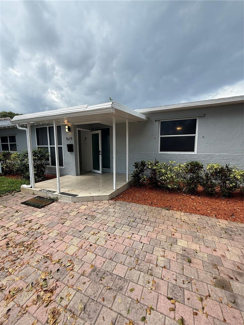 Photo of 1619 Shenandoah St, Hollywood, FL 33020 (MLS # A12010125)