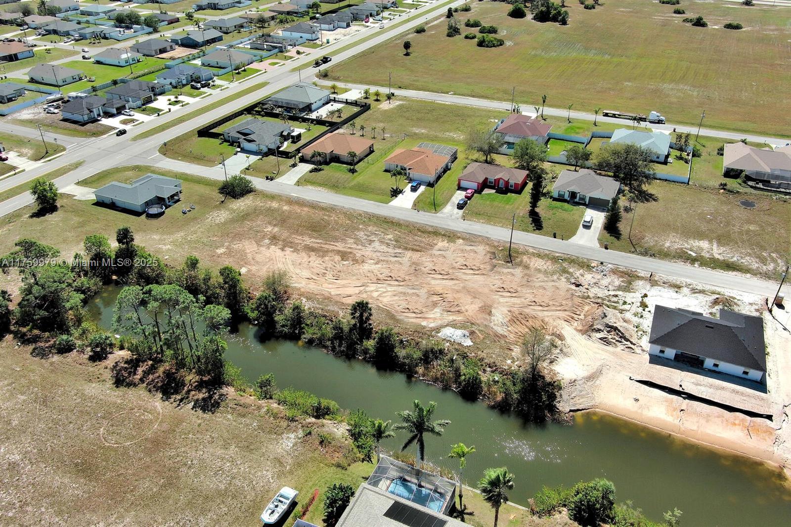 Exclusively presented by Sunland Real Estate: Oversized .35 acre waterfront lot in West Cape Coral. Cleared lot with a beautiful clear water canal in the back. Great location This lot is walking distance to Mariner High School & Mariner Middle School. Close to the Pine Island corridor for proximity to all amenities Cape Coral has to offer. Cape Coral is one of the fastest-growing cities in Florida, known for its 400+ miles of canals, offering boating, fishing, and water sports right in your backyard. Enjoy nearby parks, golf courses, shopping, dining, and easy access to stunning Gulf Coast beaches. Whether you're building your forever home or investing, this lot is a fantastic opportunity. Rare find, wont last long.