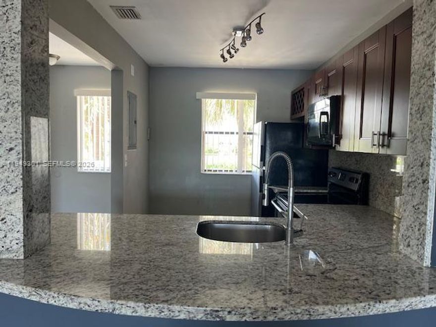 Beautiful apartment with a pleasant and peaceful view of the lake New Ac Washer & Dryer Title flooring granite counter top large walking closet large balcony w views of the lake 10' from fort lauderdalle near to I95