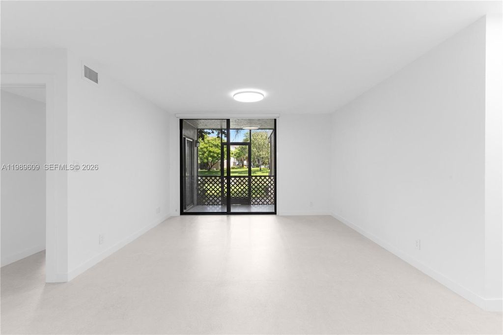 Photo of 10161 W Sunrise Blvd #101, Plantation, FL 33322 (MLS # A11989609)