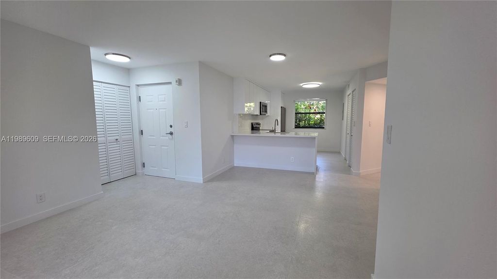 Photo of 10161 W Sunrise Blvd #101, Plantation, FL 33322 (MLS # A11989609)