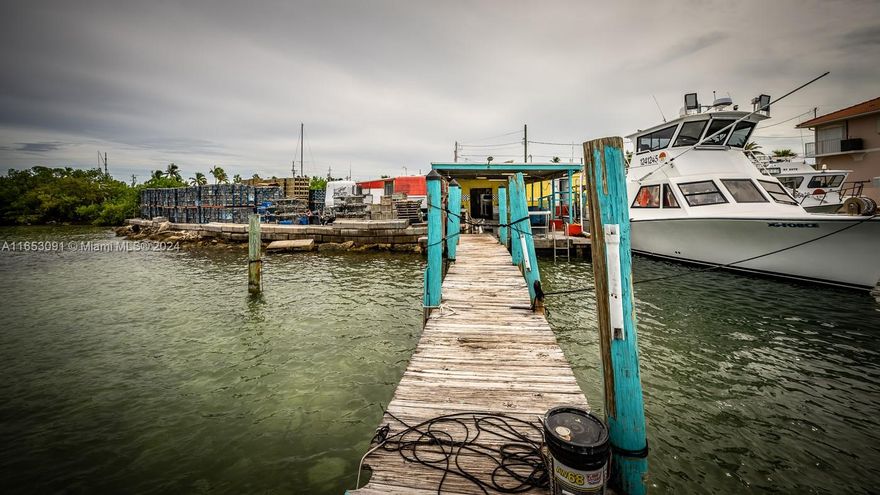 This property encompasses 15 Seaview Ave, 5 Seaview Ave, and a Vacant LT-69. It includes a fish house (approximately 1000 SQFT), a 20 ft blast freezer, 1 cooler/freezer (1 not hooked not in working condition), 2-20 ft containers boxes, 1- 30 ft container box, a Ted shed, surveillance system with 20 cameras, a lean-to working area (1 approximately 20ft x 15ft), open air covered working area, dockage can accommodate 15 boats, and there is an active permit to build a dock of 612 squared ft, but must be completed by the beginning of 2026 according to the seller, 2-1000 lb ice machines (Hoshizaki, 1 icubed ice, one flake), 2 leased 500 gallon double walled gas tanks to be paid off by the end of the year 2024.