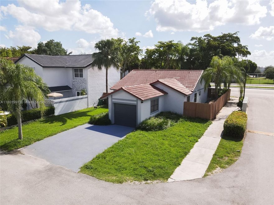 Beautifully remodeled corner-lot home featuring 3 bedrooms, 2 bathrooms, and a 1-car garage. Enjoy a modern lifestyle with a stunning porcelain floor throughout, an upgraded kitchen, and immaculate bathrooms. Located on a desirable corner lot with only one neighbor, offering extra privacy and space. Conveniently situated near the Turnpike, major highways, top-rated schools including a top Middle School and Felix Varela Sr. High, hospitals, and shopping centers. A must-see property that blends comfort, style, and an unbeatable location.