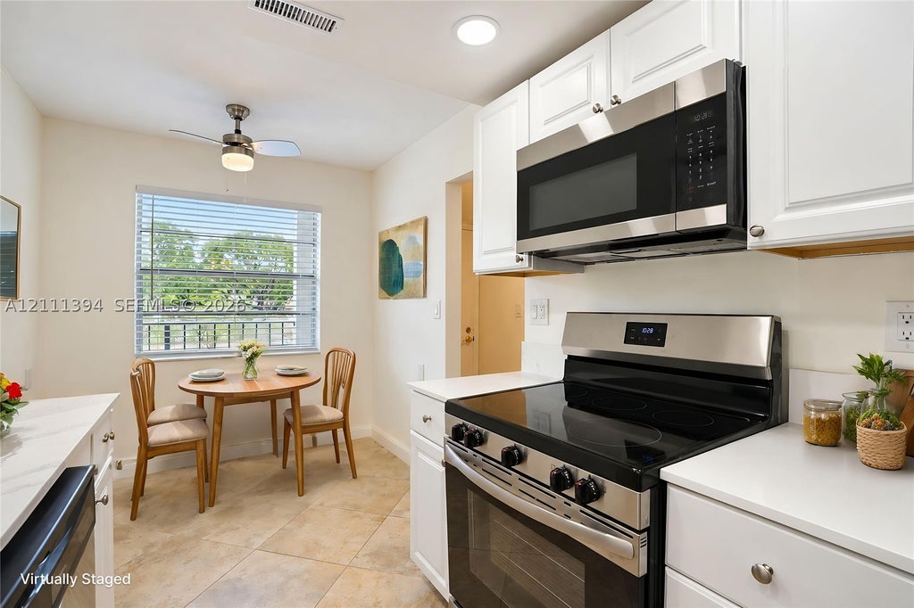 Photo of 3099 NW 48th Ave #260, Lauderdale Lakes, FL 33313 (MLS # A12111394)