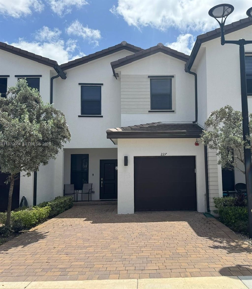 Photo of 227 SW 159th Ter #227, Pembroke Pines, FL 33027 (MLS # A11979604)