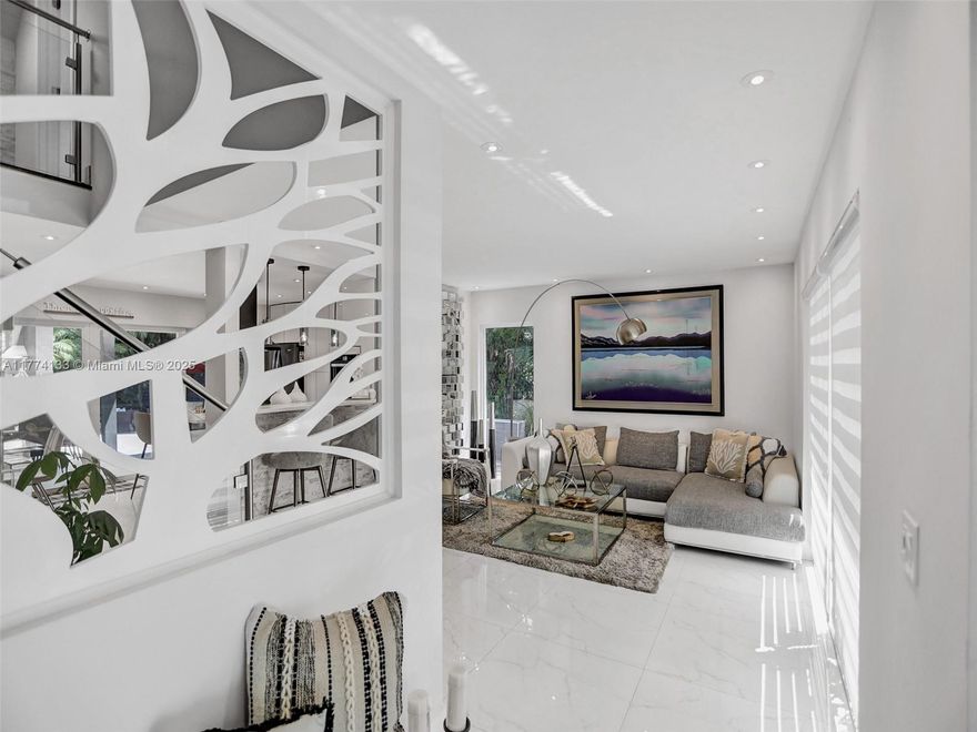 Enter a world of luxury in this beautiful 4-bedroom, 4-bathroom storybook treasure in prestigious Miami Shores. Freshly renovated, it shines with a modern kitchen, polished floors, refreshed bathrooms, a durable metal roof, high-impact windows & doors, and an updated outdoor area. Savor spacious living with two lounges, a dining space, a large office, a versatile den, and a convenient garage. Cook in the advanced kitchen or relax in the plush living zones—this home merges elegance and comfort seamlessly. Act fast—this unique property won’t last!