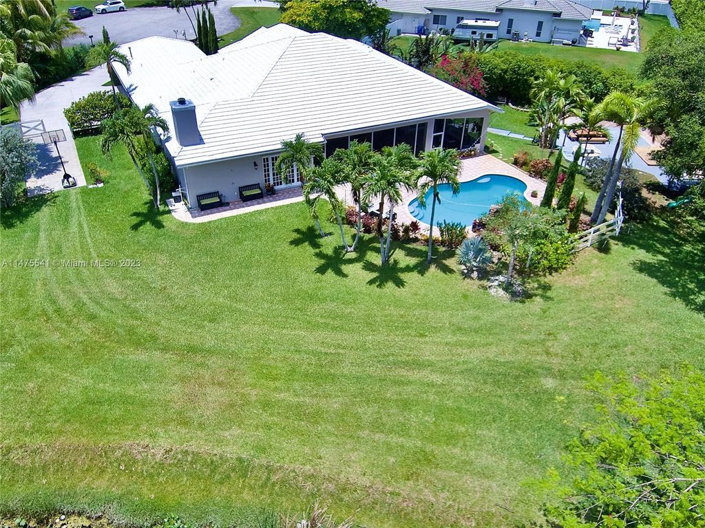 Photo of 20401 SW 52nd St, Pembroke Pines, FL 33332 (MLS # A11475541)