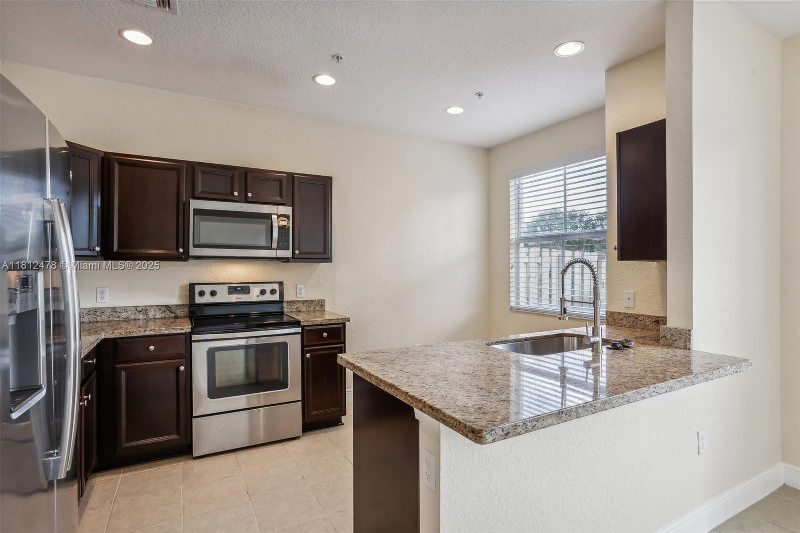 TUSCAN VILLAS CONDO - Residential
