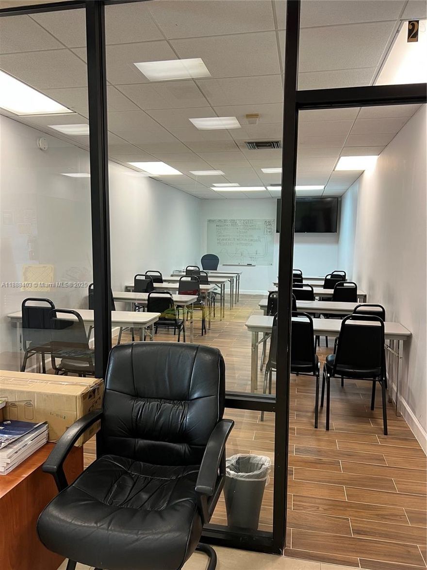 Unique fully air conditioned office space measuring approximately 3,025 SF. Includes Kitchen break room with water fountains, 2 restrooms, 3 glass enclosed rooms excellent for class room or private office setting. Bank vault included in the space-excellent for financial institution, jewelry store, tool sales, etc. Double glass pedestrian door with single door exit in the rear. Ample parking. Easy access to Palmetto 826 at NW 74th Street. Frontage to busy NW 72 Avenue. Unincorporated Miami-Dade County. Just south of Town of Medley and east of the City of Doral.