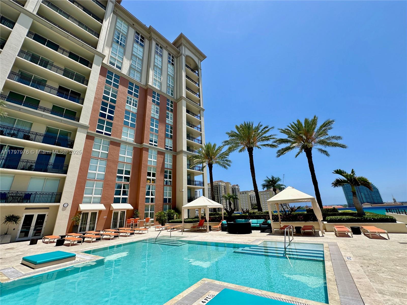 Discover the Perfect Urban Sanctuary! Downtown West Palm Beach is booming with new office towers, new luxury developments and vibrant transformations at "CityPlace". SECURE YOUR SPOT NOW! Fully furnished, move-in ready 1 Bed/1 Bath Condo with open kitchen, stainless steel appliances and spacious balcony. Washer & dryer inside. Same-level garage parking. PET-FRIENDLY. Residents have access to modern, resort-style amenities: stunning Pool Area and Sun Deck, fitness center, steam room, sauna, elegant club lounge, conference room, outdoor kitchen and beautifully curated common spaces. RENT IT: 30-day min./12x per year. PRIME LOCATION: Walk to RH Rooftop Restaurant, Convention Center, Kravis Center and the Brightline Station. Close to Beaches. READY TO MAKE YOUR MOVE?