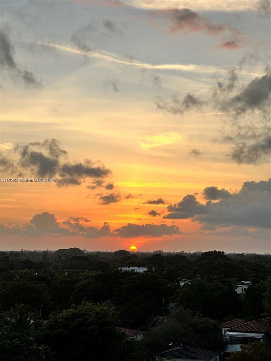 Enjoy sunset views over Coral Gables in this updated 2 bedroom 2 bathroom condo. Walking distance to The Plaza and Miracle Mile, 15 minutes to beaches and Downtown. Two parking spaces in the gated garage. In-unit Washer and dryer. New A/C in 2021. Special Assessments already paid.