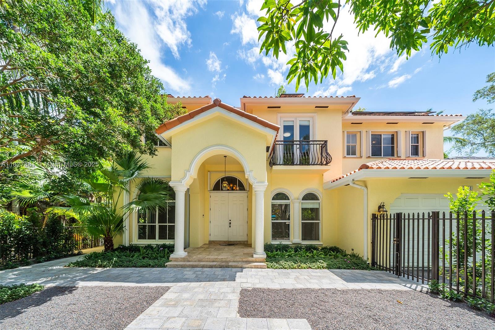 Rarely available 5BD retreat on quiet Coconut Grove cul-de-sac! Elevated and beautifully upgraded, this light-filled home features soaring 11'–20' ceilings, marble and refinished hardwood floors, and an entertainer’s layout. The first floor offers living and dining areas, a spacious family room, and an open kitchen with new appliances, a wine cooler, and a breakfast nook—plus 1BD, laundry room, and 2-car garage. Upstairs, unwind in the primary suite with dual walk-in closets, a spa-style bath, and a private terrace—plus 3 more BDs. Enjoy a lush backyard with a heated, salt-chlorination pool and jacuzzi, and a fantastic mango tree. Solar-powered with an EV charger, 2 Tesla walls, new 2-zone A/C, and more. Steps to Coconut Grove schools, parks, and marinas—minutes to downtown and beaches.