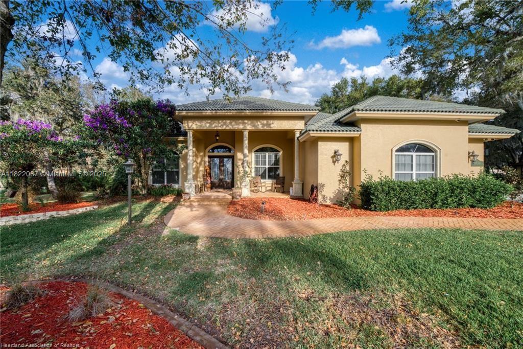 Welcome to this stunning executive golf home located in the highly sought-after Country Club of Sebring.Set on .62 acres, this home boasts elegance and grandeur, perfect for both relaxed living & entertaining.The split floor plan offers privacy for the master suite while the two additional bedrooms and two full baths provide comfort for family or guests.The gourmet kitchen is complete with granite countertops, ample cabinetry and newer stainless steel appliances.Adjacent to the kitchen is the butler’s pantry/mudroom & an oversized laundry room equipped with counter space, cabinetry and a sink.From the kitchen and living areas, step out onto the expansive lanai, perfect for outdoor dining and relaxation, overlooking the lush green fairways of the golf course.This home is truly a must-see!