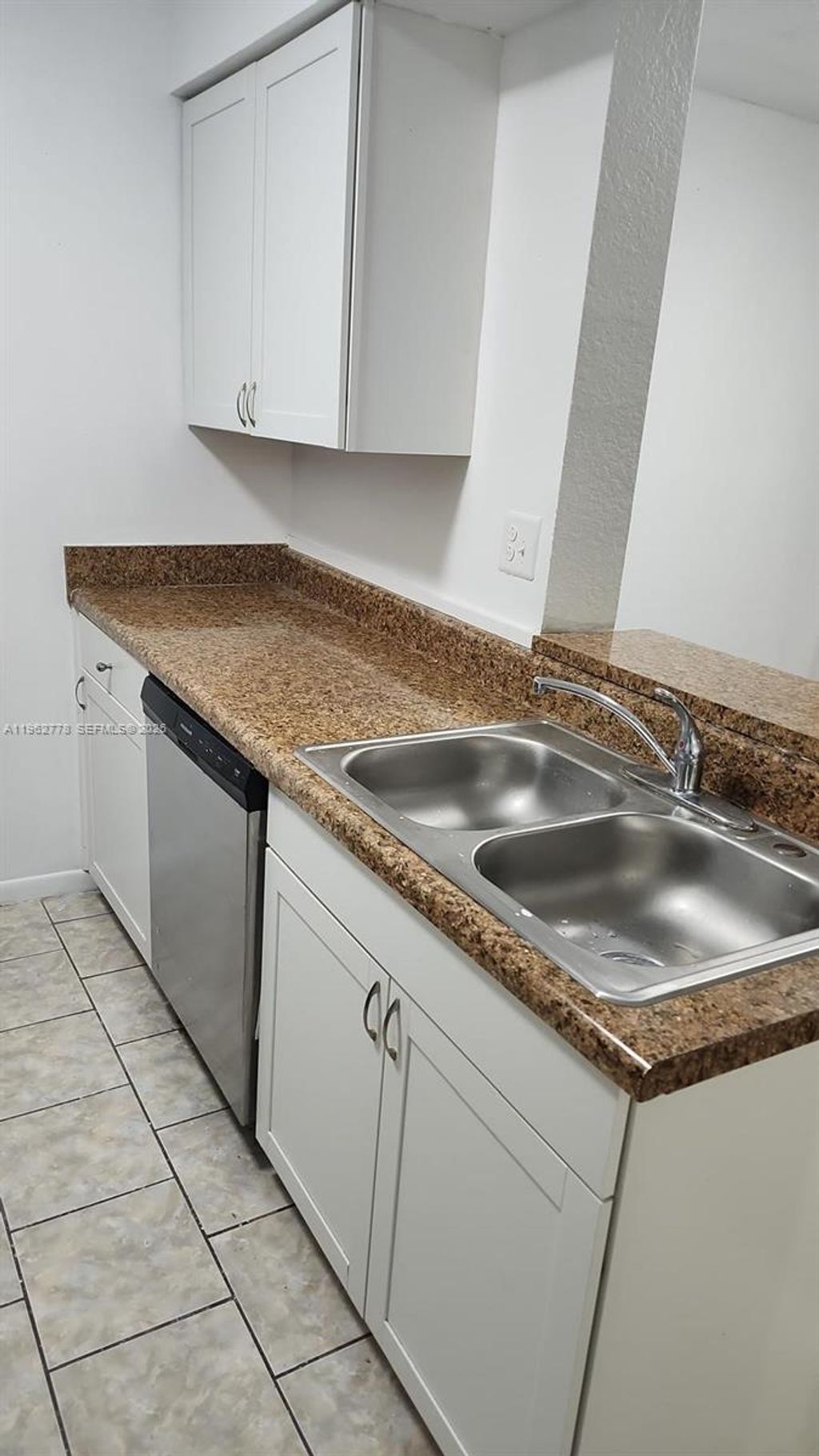 Photo of 2850 N Oakland Forest Dr #103, Oakland Park, FL 33309 (MLS # A11962778)