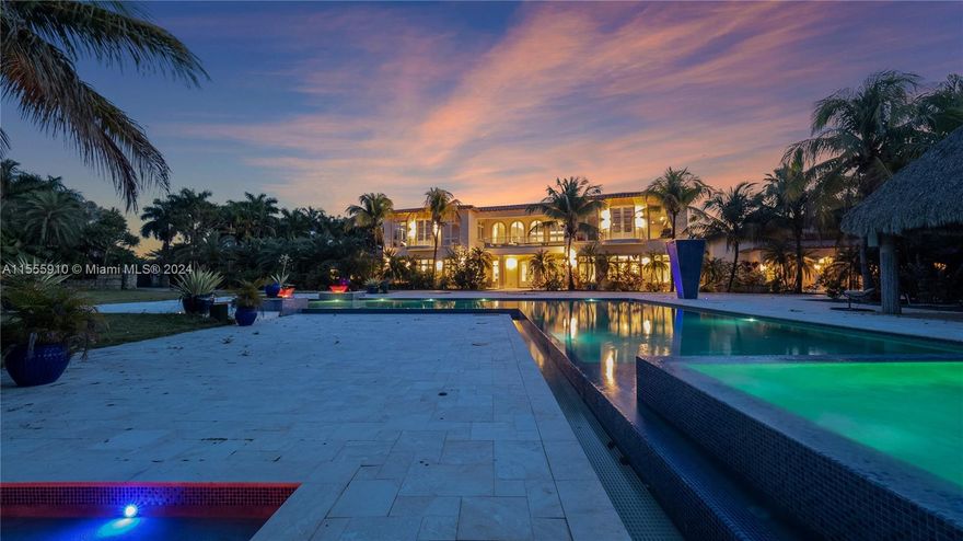 Welcome to "The Palace," an extraordinary estate nestled in Redland, sprawling over 18 acres that encapsulate a blend of luxury, privacy, and nature. This magnificent compound is a marvel of architecture and design, featuring an expansive 33,067 Sq Ft residence with 10 bedrooms and 11 bathrooms, tailored for sophisticated living and unparalleled entertaining.
The estate’s outdoor charm is highlighted by a state-of-the-art L-shaped pool with waterfalls, a jacuzzi, a cold plunge, and an outdoor kitchen and extensive entertaining area. The property also features a private lake for cliff jumping, surrounded by tropical gardens and a diverse collection of exotic fruit trees, offering a serene retreat from the outside world.