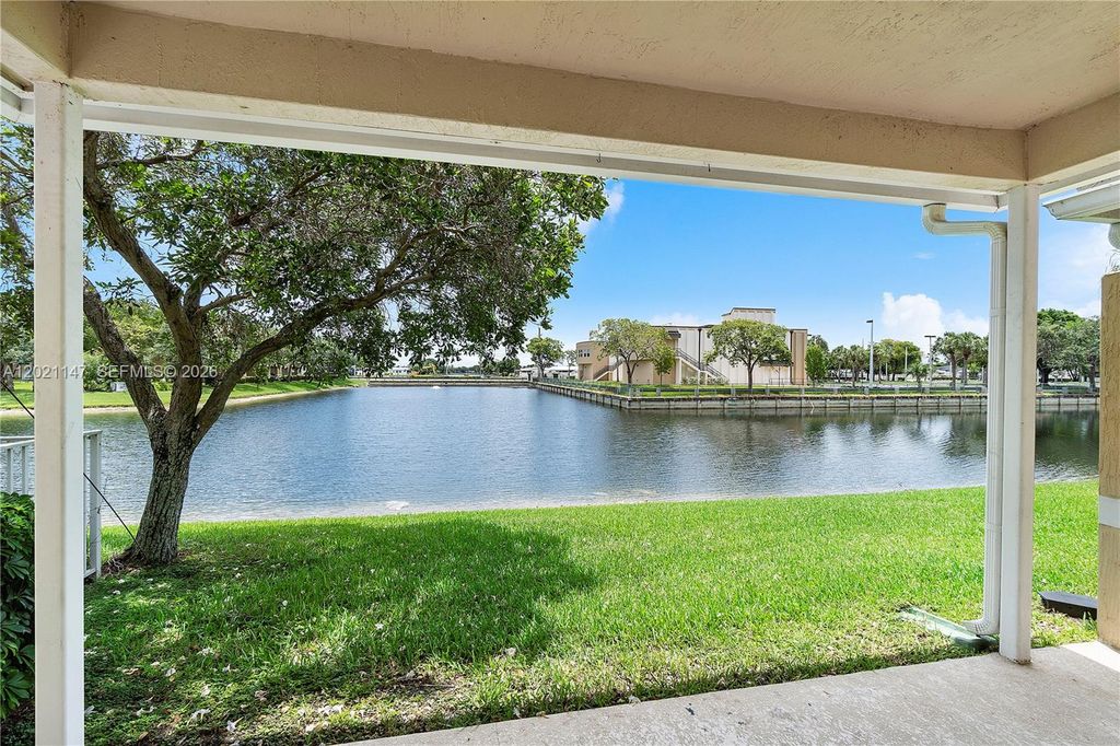 Photo of 5930 Abbey Rd, Tamarac, FL 33321 (MLS # A12021147)