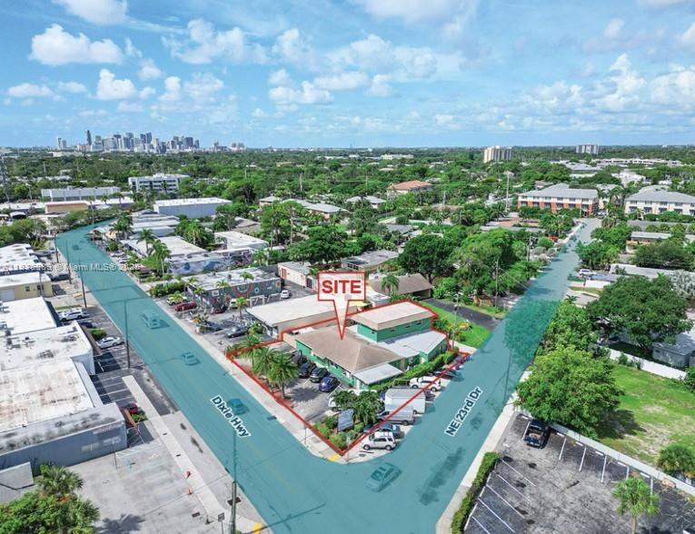 Prime Location on Dixie Corridor Near 5 Points & Wilton Drive! This mixed-use building offers a fantastic opportunity for investor owners. Located in the heart of Wilton Manors, just steps away from the vibrant entertainment, theaters, and dining options along Wilton Drive, you'll be next door to the exciting new Wilton Hotel & Spa development.