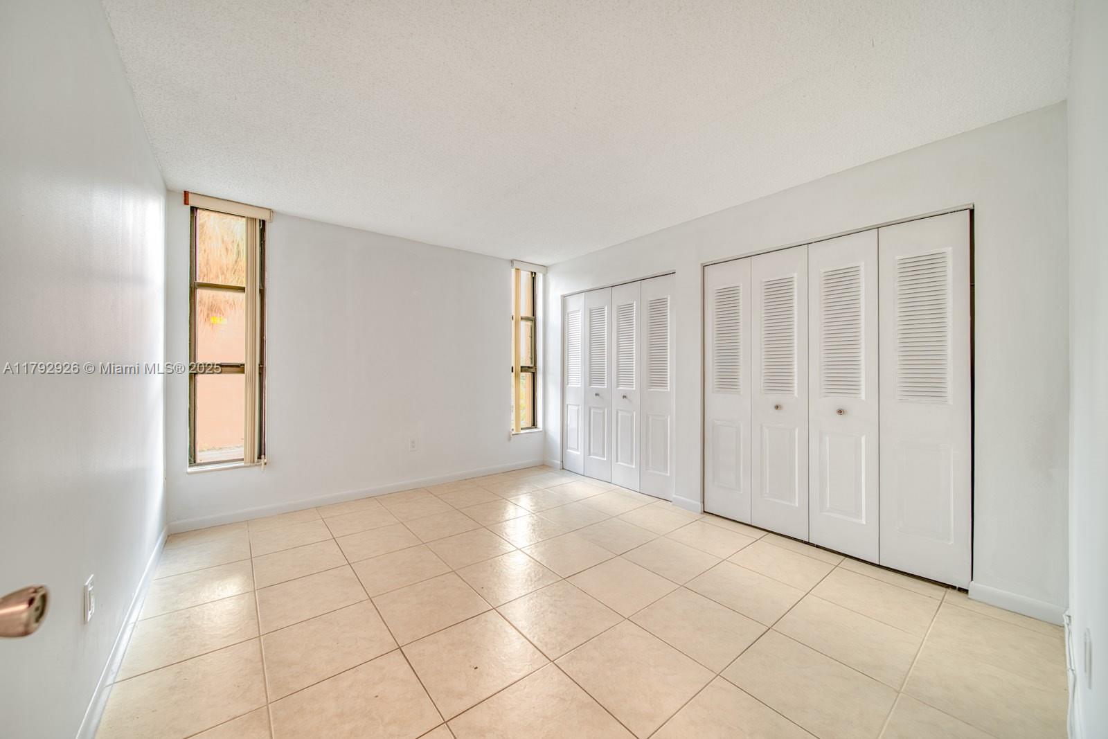 VERSIALLES GARDENS II CON - Residential Lease