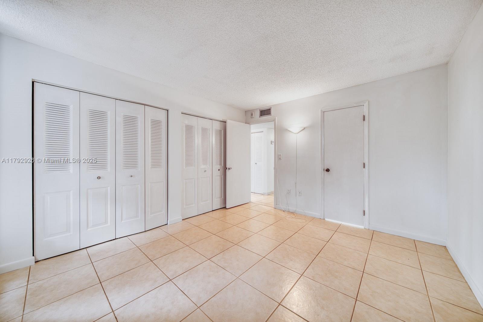 VERSIALLES GARDENS II CON - Residential Lease