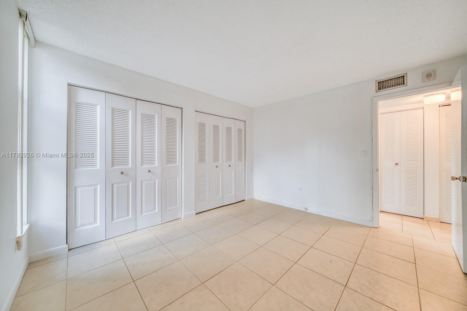 VERSIALLES GARDENS II CON - Residential Lease