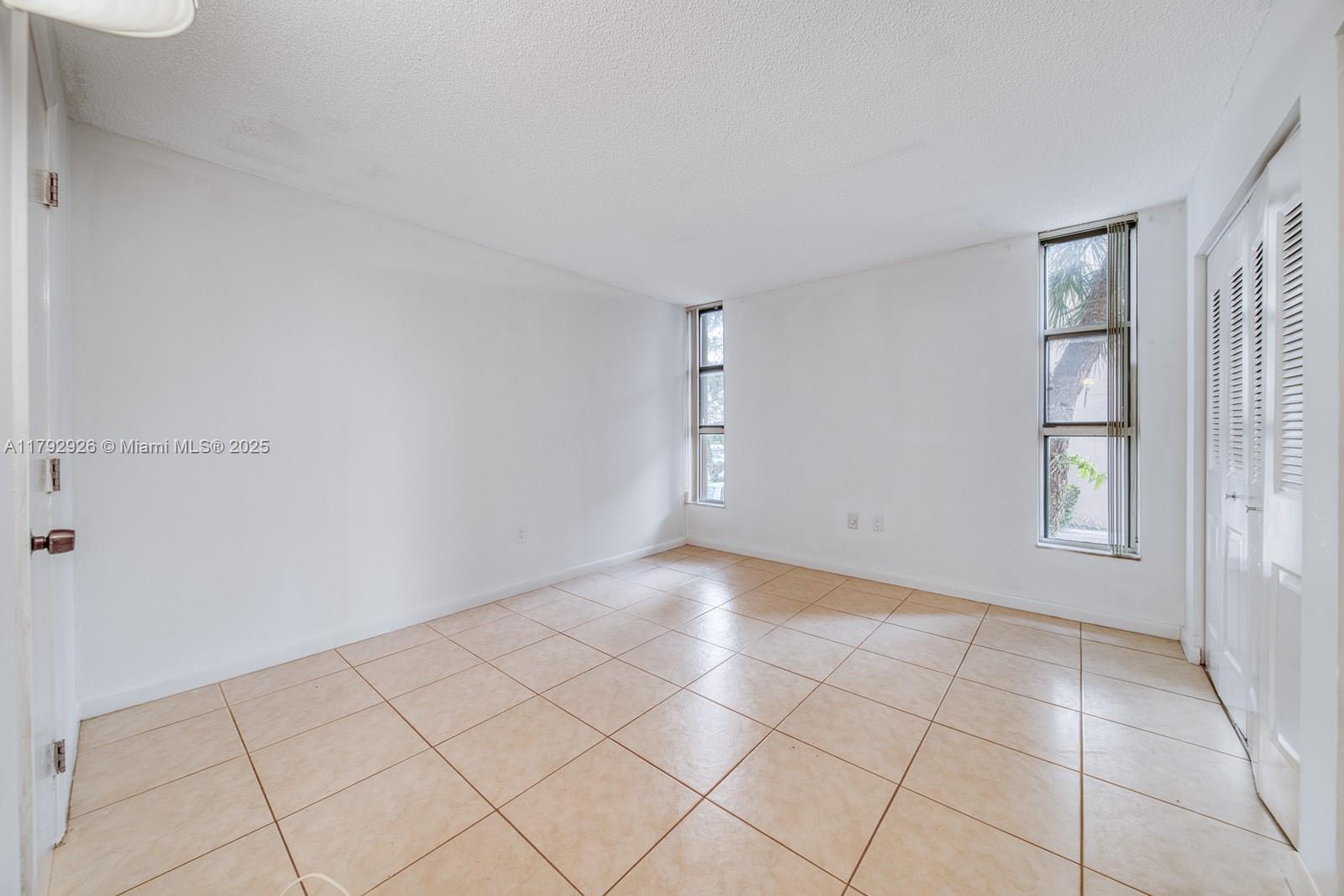 VERSIALLES GARDENS II CON - Residential Lease