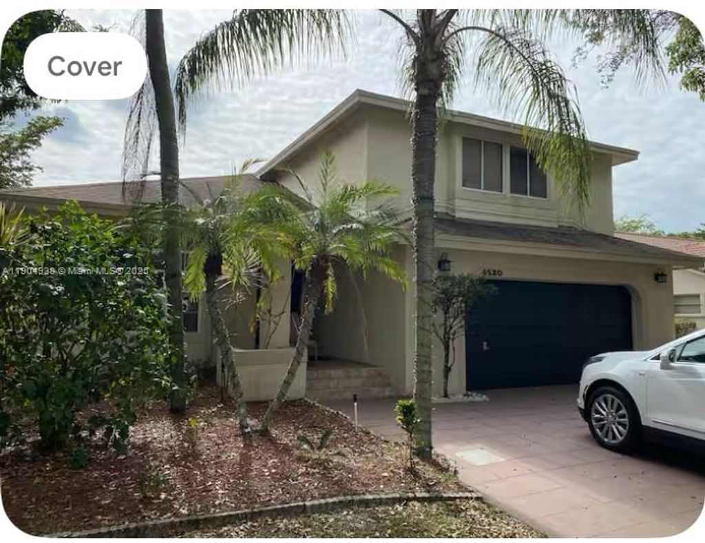 Photo of 4520 NW 52nd St, Coconut Creek, FL 33073 (MLS # A11904938)