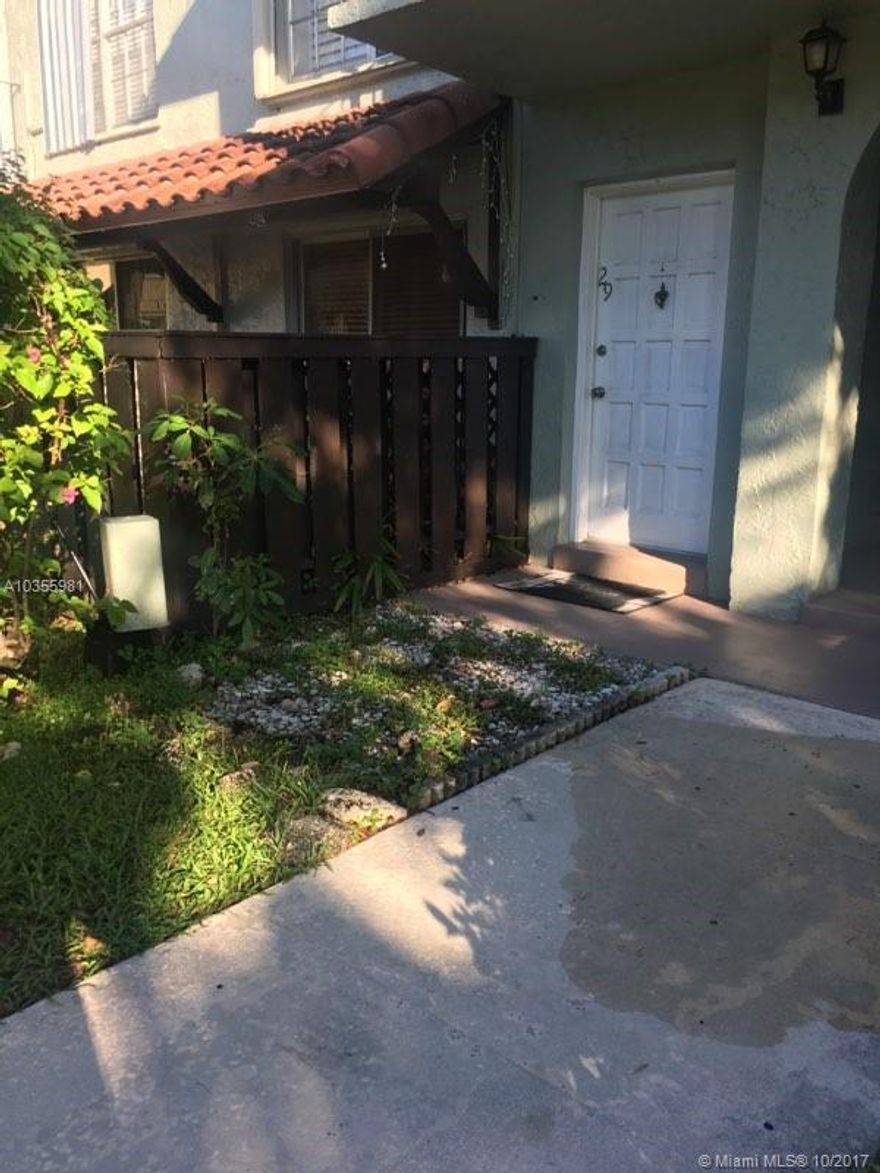COZY FIRST FLOOR CORNER UNIT WITH PATIO.   CERAMIC FLOORING. UPGRADED KITCHEN AND BATH CABINETS. SUPERB LOCATION ACROSS FROM SHOPPING CENTER, NEAR HIGHWAYS, TRANSPORTATION, CHURCH & MIAMI DADE SOUTH COMMUNITY COLLEGE.  COMMUNITY HAS CLUBHOUSE, 3 SWIMMING POOLS, TENNIS COURTS, GATED ENTRANCE WITH ADDITIONAL SECURITY.  LOW MAINTENANCE ONLY $200.42 PER MONTH. MONTH TO MONTH TENANT OCCUPIED.  PERFECT FOR OWNER OCCUPANT OR INVESTOR