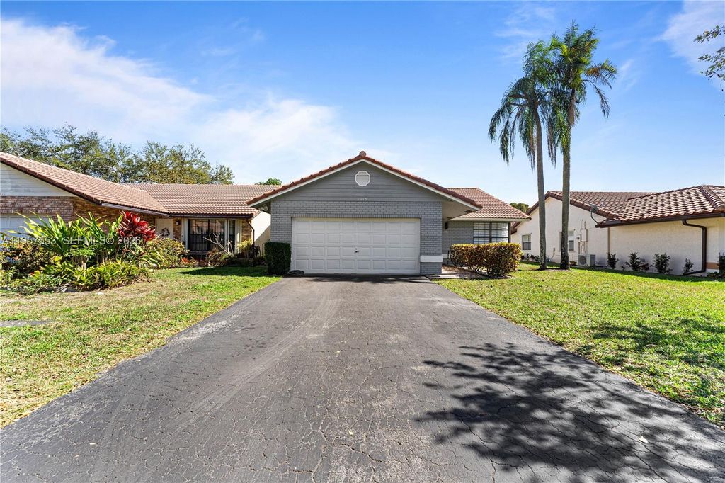 Photo of 2915 NW 95th Ave, Coral Springs, FL 33065 (MLS # A11957553)