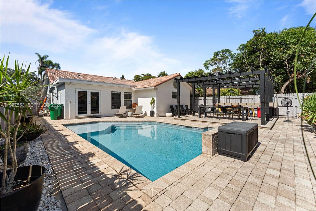 Photo of 2915 NW 95th Ave, Coral Springs, FL 33065 (MLS # A11957553)
