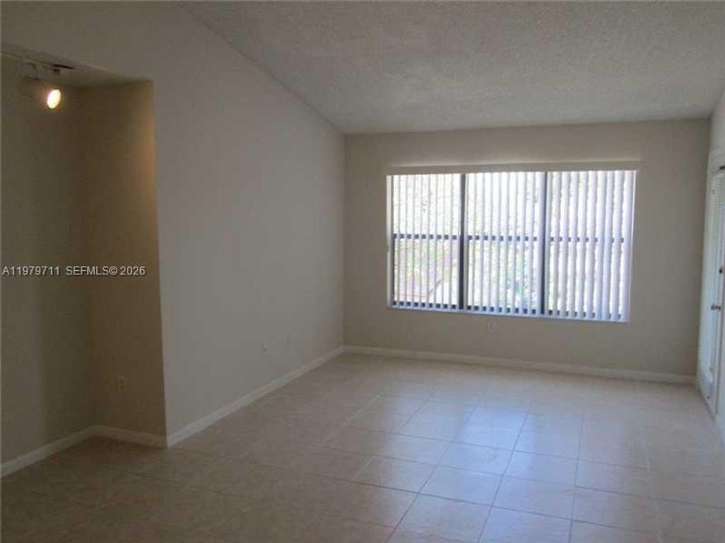 Photo of 4241 W Mcnab Rd #30, Pompano Beach, FL 33069 (MLS # A11979711)